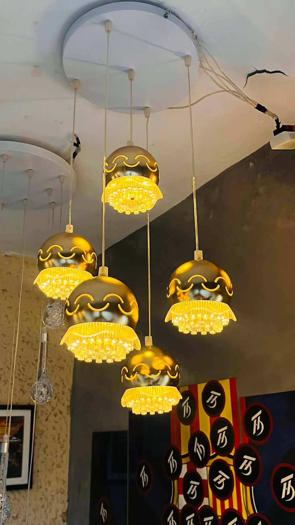 Golden Aura Ceiling Light Modern ঝাড়বাতি -ঘরের আধুনিকতার আলোয় বদলে দিন এক্সক্লুসিভ ঝাড়বাতির স্পর্শে(Transform your home into a modern space with the touch of an exclusive chandelier)